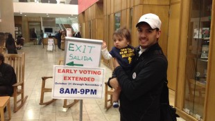 Abe Saffer voting with his son, Carson.