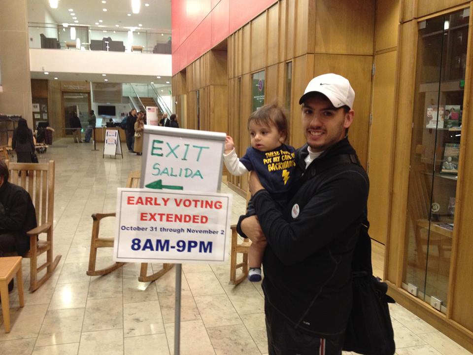 Abe Saffer voting with his son, Carson.